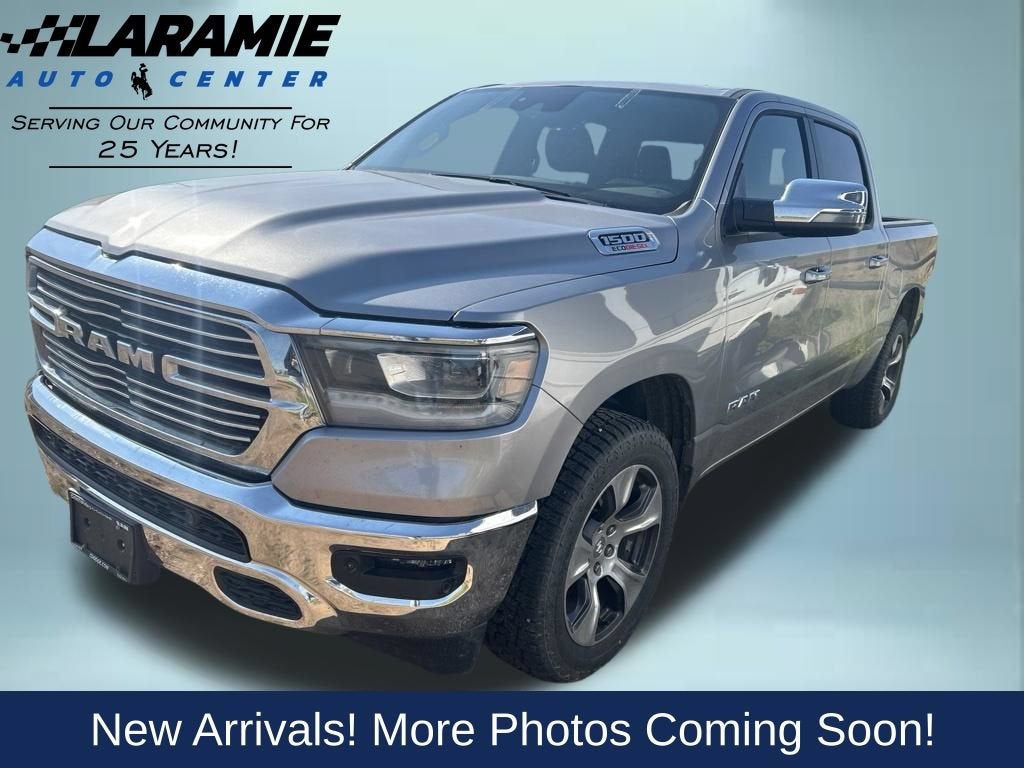 2023 RAM 1500 Laramie Crew Cab 4x4 5'7" Box in Silver — front three-quarter view