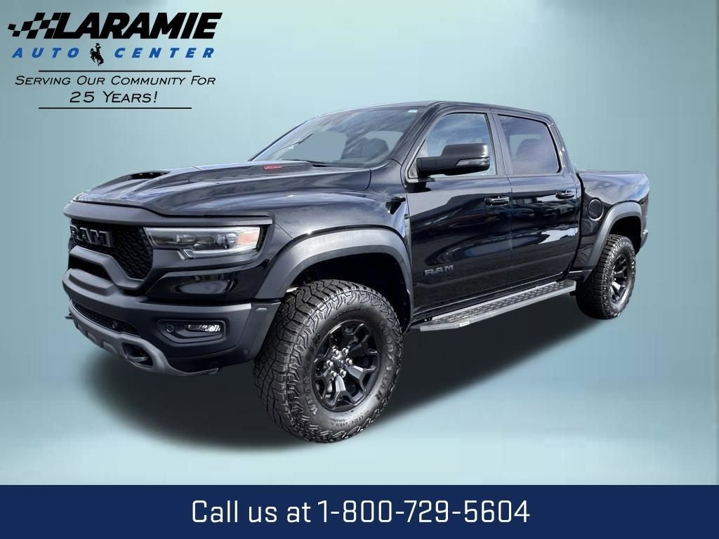 2024 RAM 1500 TRX Crew Cab 4x4 5'7" Box in Black — front three-quarter view