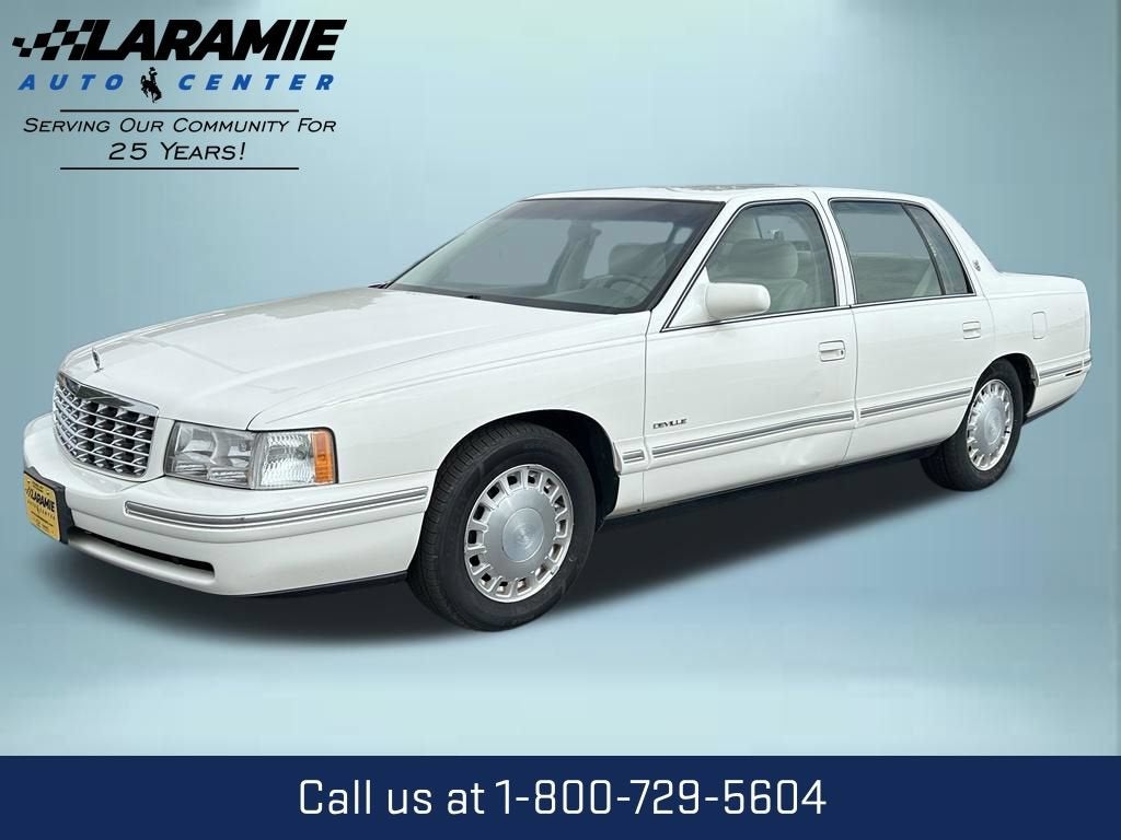 1999 Cadillac Deville Standard in Cotillion White — front three-quarter view