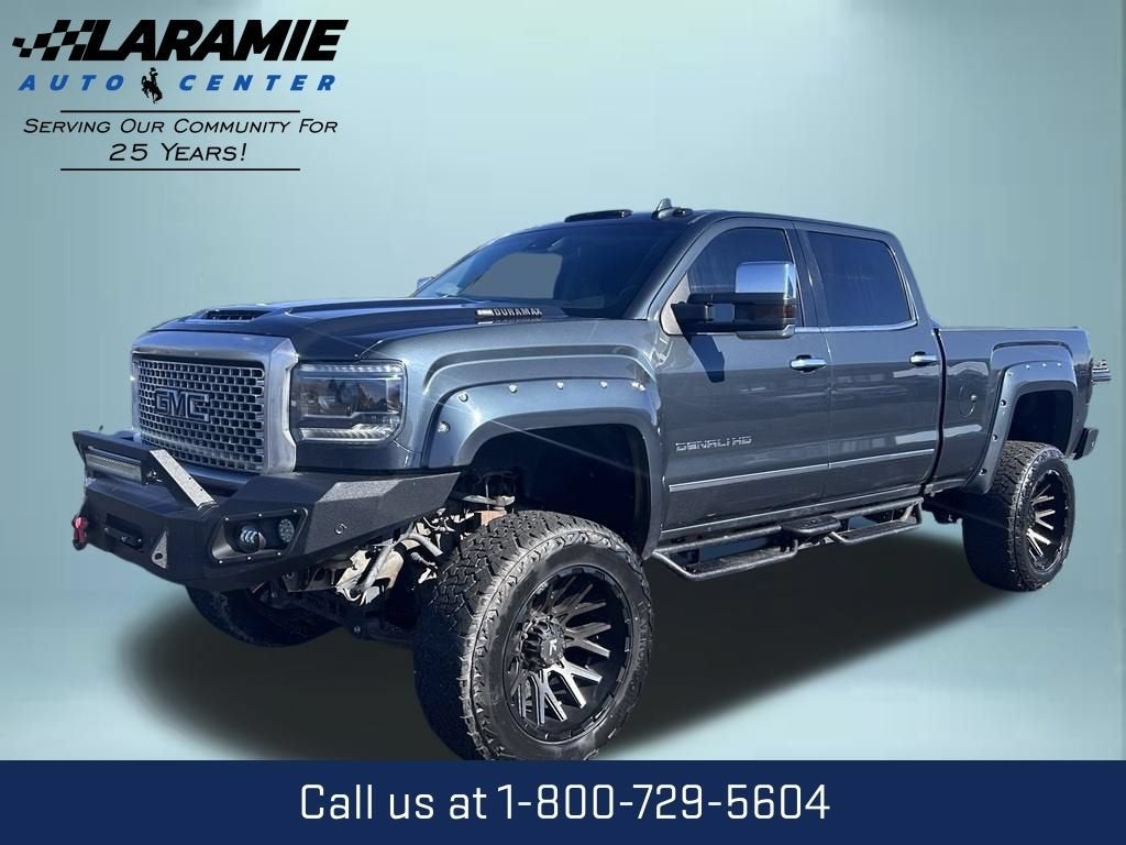 2017 GMC Sierra 2500 HD Denali in Dark Slate Metallic — front three-quarter view