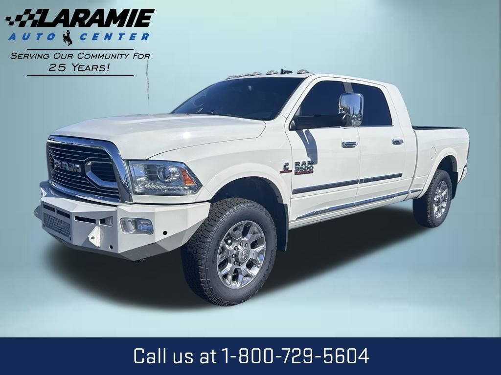 2017 RAM 3500 Limited Mega Cab 4x4 6'4" Box in White — front three-quarter view
