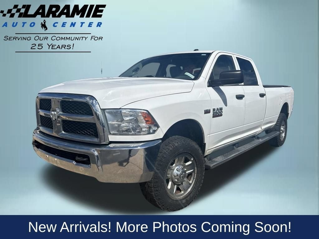 2014 RAM 2500 Tradesman in White — front three-quarter view