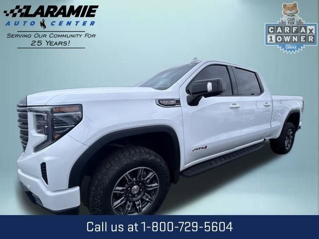 2025 GMC Sierra 1500 AT4 in Summit White — front three-quarter view