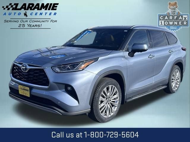 2024 Toyota Highlander Hybrid Platinum in Blue — front three-quarter view