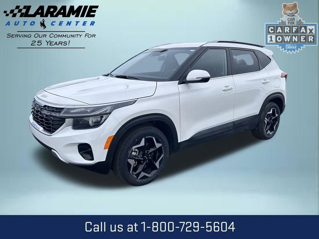 2025 Kia Seltos EX in White — front three-quarter view